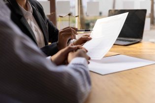 legal-professionals-reviewing-documents-in-a-brigh-2026-01-09-00-57-19-utc_11zon